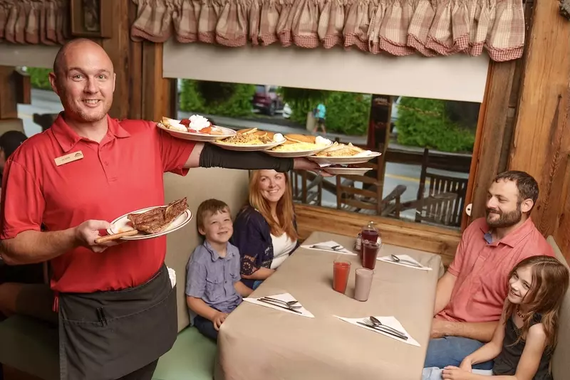 server and family at Log Cabin Pancake House in Gatlinburg